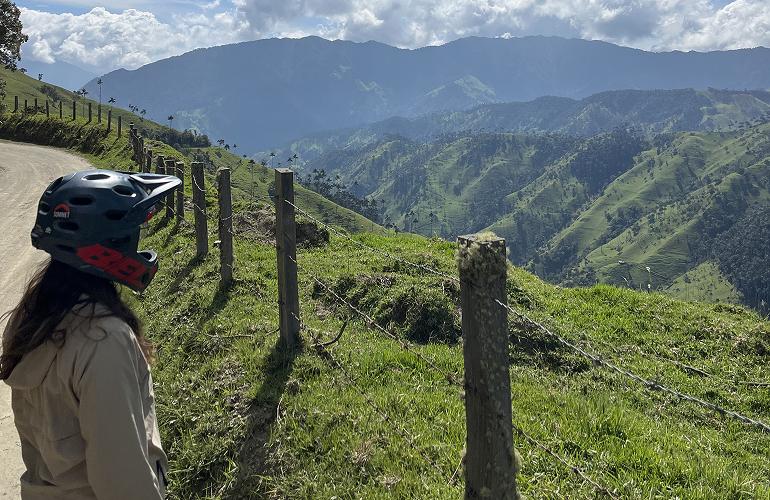 Daniela admiring the landscape on a mountain bike ride in La Carbonera, Colombia