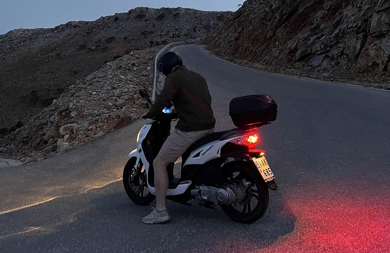 Jordan on a scooter in Greece